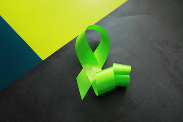 Colored ribbon symbol. Symbol of struggle. Background with ribbon.