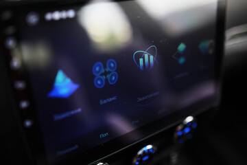 The process of choosing climate control in the car. Various controls in auto switches. Modern car...