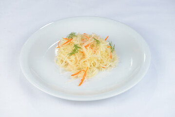 sauerkraut salad on a white plate