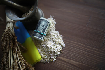 The concept of the cost of grain. 5000 ruble banknotes around a handful of ground grain. World...