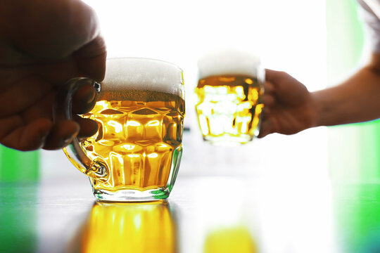 Saint Patrick's Day holiday. National Irish holiday. A mug of golden beer at the bar.