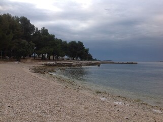 Scenic Croatian beach with cloudy sky
