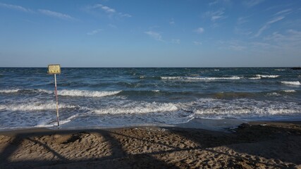Adriatic Sea with gentle waves and blue sky