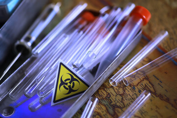 Ukrainian flag biohazard and test tubes. Assistance to Ukraine in biolaboratories. Western...