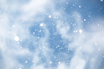 blue snowfall bokeh background, abstract snowflake background on blurred abstract blue