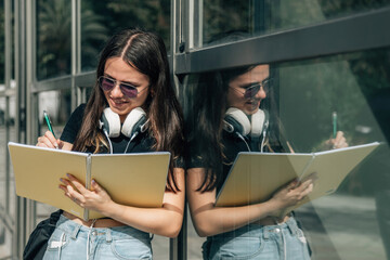Teenage girl finishes up homework before school