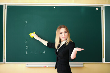 Young teacher in school class