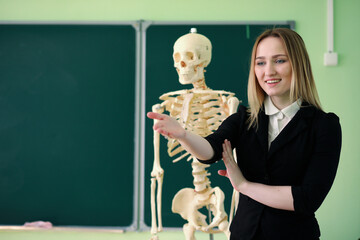 Young teacher in school class