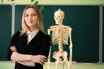 Young teacher in school class