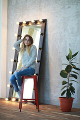 A young girl rests in a cozy room
