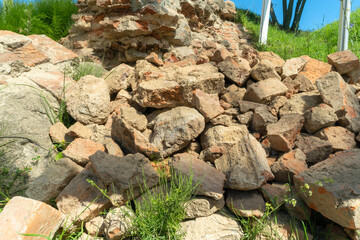 Urban Archaeology Site Showing Layers Of Old Brickwork And Soil In Historical Excavation Area....