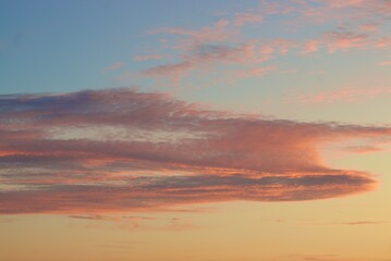 Vibrant pink and orange sunset clouds, forming a picturesque sky canvas.