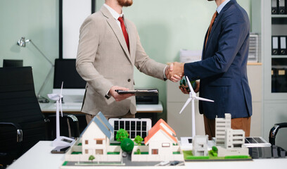 Modern office meeting of architects, designers, and developers creating innovative, sustainable...