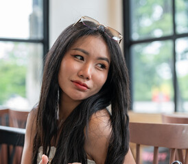 Pretty Thai Girl in Coffee Shop