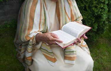 Old man reading the book