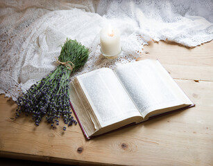 A bouquet of lavender near an open bible