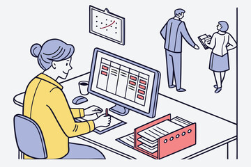 Office teamwork and productivity highlighted by a focused employee working on a computer while colleagues discuss documents in a modern workspace