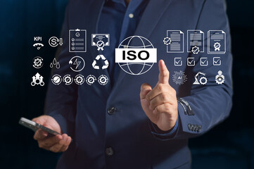 Businessman shows signs of ISO certification, quality assurance, guarantee, standardization concept, satisfaction, receiving service experience, and the standards of products and services.