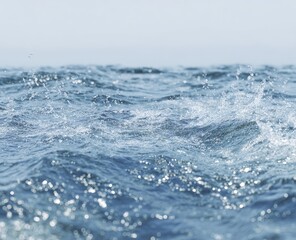 Light blue ocean waves with splashes