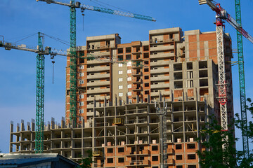 Construction of buildings.New house.Large high rise crane