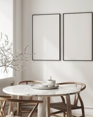 Fototapeta premium Minimalist dining room interior with two blank frames above a round marble table with wooden chairs and a vase with white flowers in a window