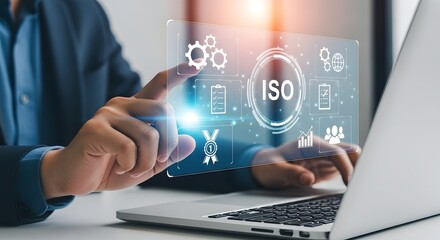 Business professional interacting with iso certification digital interface