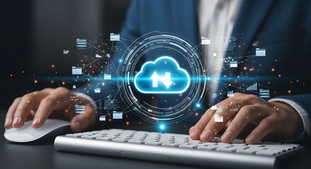 Person using computer with glowing cloud technology interface