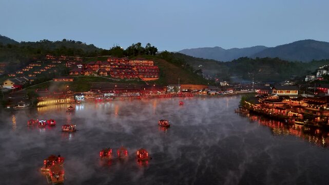 Magical Sunrise Over Ban Rak Thai &ndash; Traditional Houseboats and Misty Lake from Above