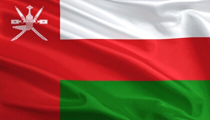 Obraz premium Flag of Oman waving against a blue sky with light clouds.