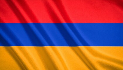 Naklejka premium Armenian flag with horizontal red, blue, and orange stripes, displayed on a textured, gently waving fabric.
