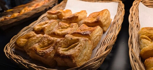 pile of puff pastry in the tray, food background