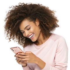 Woman with curly hair smiling while looking at her rose gold smartphone female afro