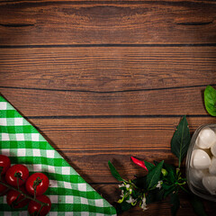 Background for Pizza with tomatoes, mozzarella cheese, black olives and basil. Mock up for...