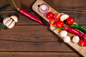 Background for Pizza with tomatoes, mozzarella cheese, black olives and basil. Mock up for...