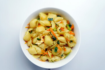 tasty pasta  white bowl on white background