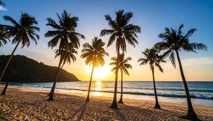Obraz premium Tropical beach at sunset with palm trees