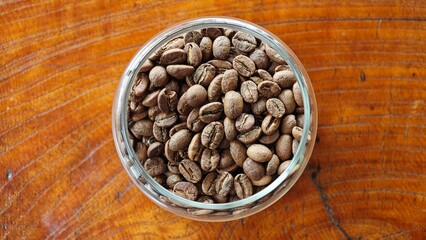 Coffee beans in a crystal jar.