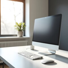 Fototapeta premium Minimalist computer desk setup with natural light in modern office