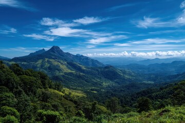 Obraz premium Breathtaking scenery featuring hills and mountains under a clear blue sky an impressive trekking destination