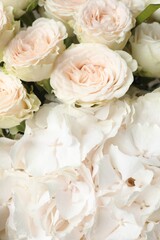 Close up of beautiful bouquet with peony roses and white hydrangea