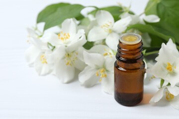 Cosmetic care - Jasmine essential oil with fresh jasmine flowers 