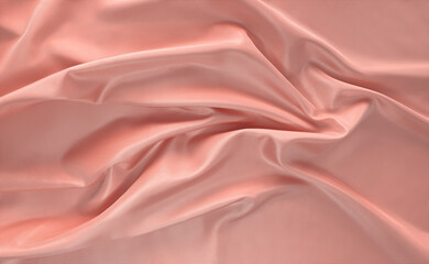 Elegant peach satin with natural folds and smooth highlights creates a sensual, soft surface. The...