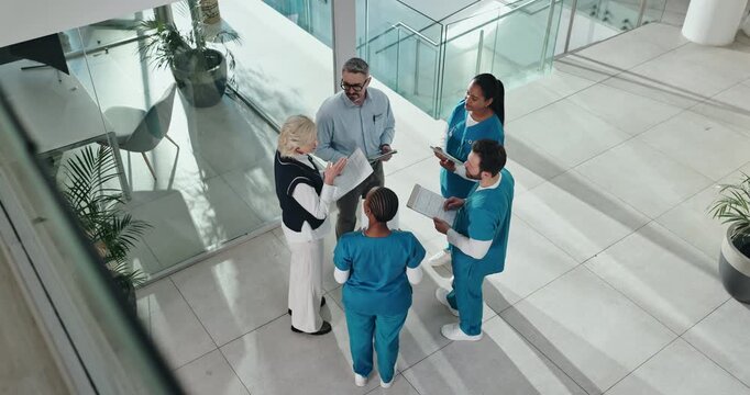 Business, people and doctors in meeting with paperwork for surgery funding, feedback or action plan. Above, hospital staff or medical team with discussion for clinic management or healthcare support