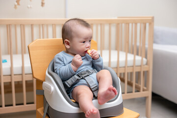 Baby enjoy the rice cracker at home