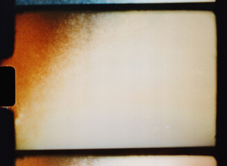 Old film frame showing light leaks and scratches background texture