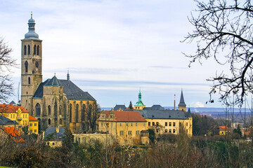 Gothic church of Saint James in Town of Kutna Hora, Czechia. Its tall spire and detailed stonework dominate the skyline, reflecting medieval craftsmanship and rich local history