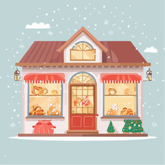 A charming bakery building with display windows full of delicious baked goods, set against a snowy winter backdrop.