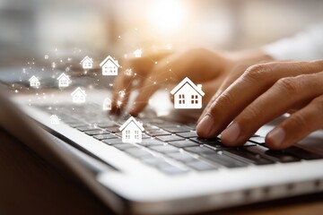 Hands typing on laptop, house icons overlay (1)