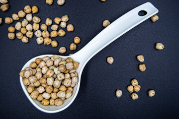 Beautiful organic dried chickpea beans consisting of raw bengal legume pea
