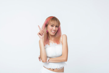 Smiling young Asian woman with raised finger